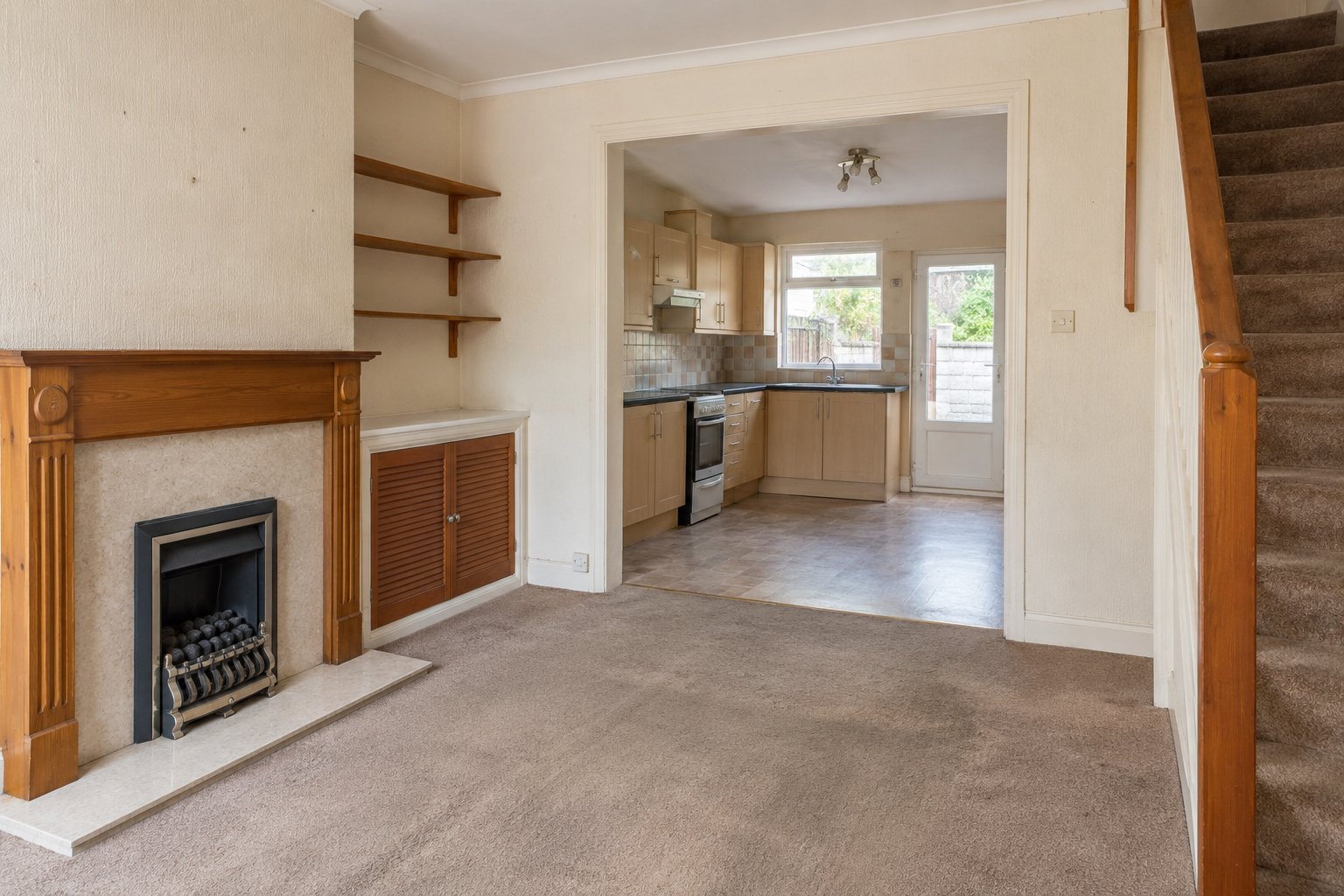 Renovation-potential visual of a brighter living room and kitchen